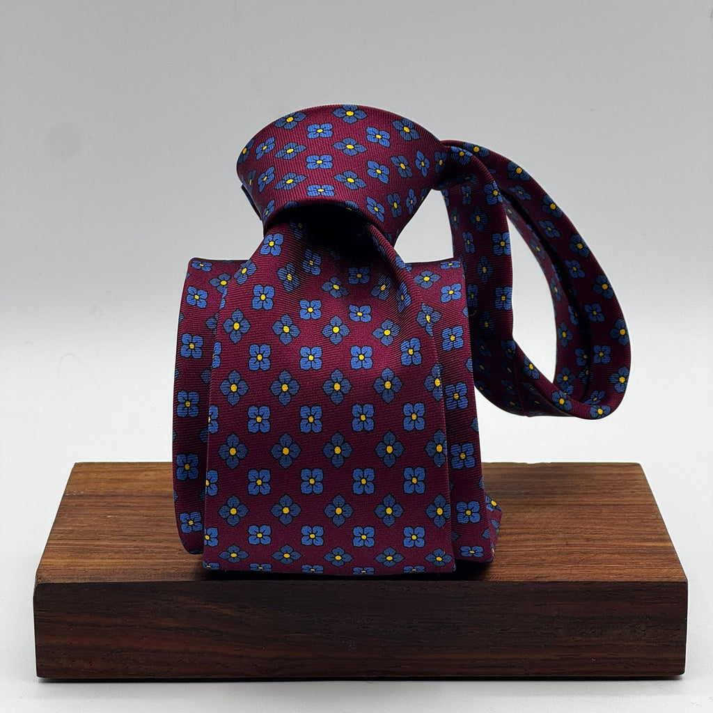 Cruciani &amp; Bella
100% Printed Silk&nbsp;
Tipped
Red Wine, Blue Light Blue and Yellow,Floral Motif Tie
Handmade in Italy
8 cm x 148 cm
New Old Stock