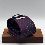 Cruciani &amp; Bella
100% Printed Silk&nbsp;
Tipped
Dark Blue, Red and Yellow Floral Motif Tie
Handmade in Italy
8 cm x 148 cm
New Old Stock