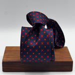 Cruciani &amp; Bella
100% Printed Silk&nbsp;
Tipped
Dark Blue, Red and Yellow Floral Motif Tie
Handmade in Italy
8 cm x 148 cm
New Old Stock