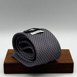 Cruciani &amp; Bella
100% Printed Silk&nbsp;
Tipped
Grey, Red and Off White Motif Tie
Handmade in Italy
8 cm x 148 cm
New Old Stock