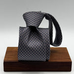 Cruciani &amp; Bella
100% Printed Silk&nbsp;
Tipped
Grey, Red and Off White Motif Tie
Handmade in Italy
8 cm x 148 cm
New Old Stock
