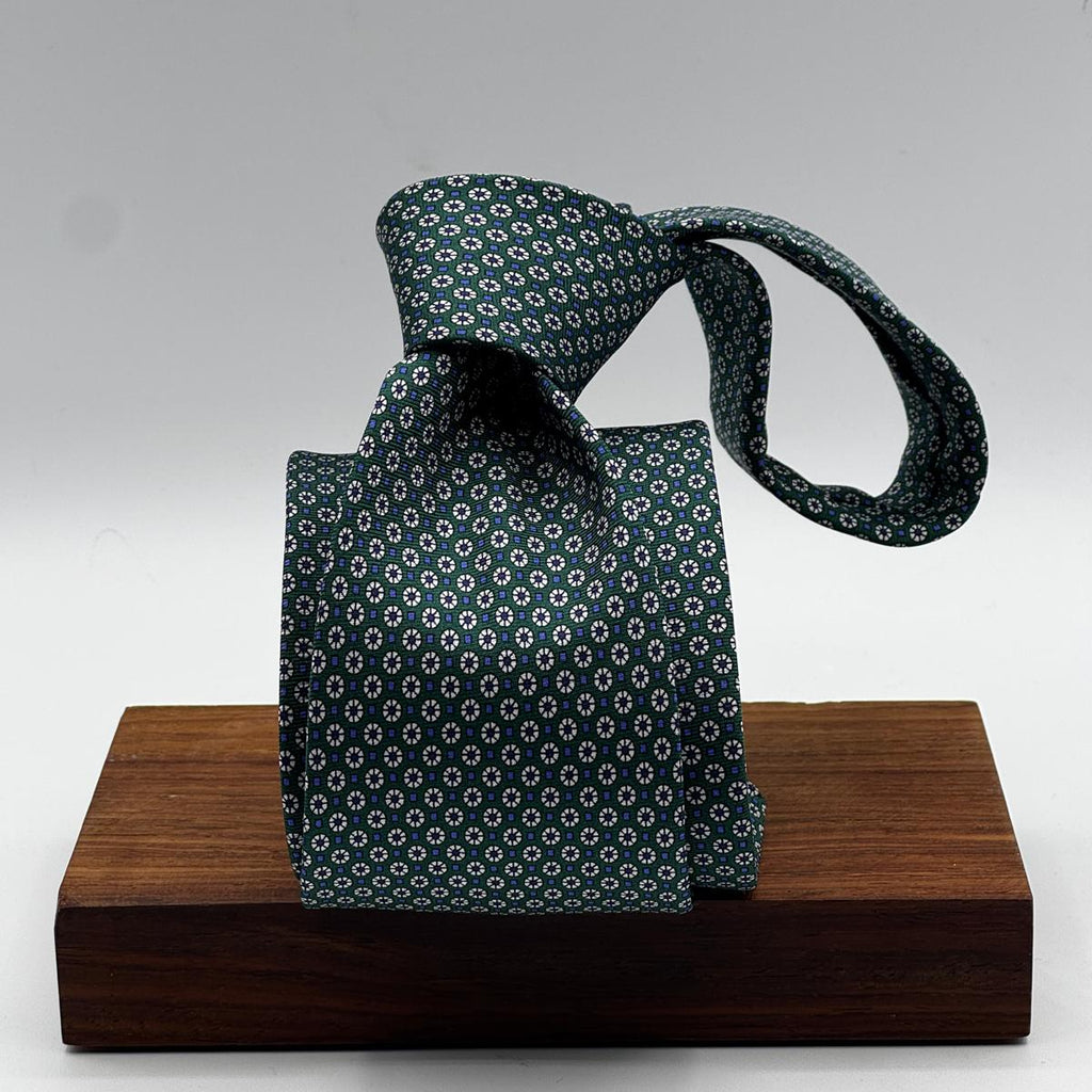 Cruciani &amp; Bella
100% Printed Silk&nbsp;
Tipped
Green, Light Blue and Off White Motif Tie
Handmade in Italy
8 cm x 148 cm
New Old Stock