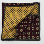 Cruciani &amp; Bella
Hand-rolled&nbsp;&nbsp;
100%&nbsp; Madder Silk Double
Red Wine, Green, Beige and Yellow

Motif Pocket Square
Made in Italy
33 cm X 33 cm