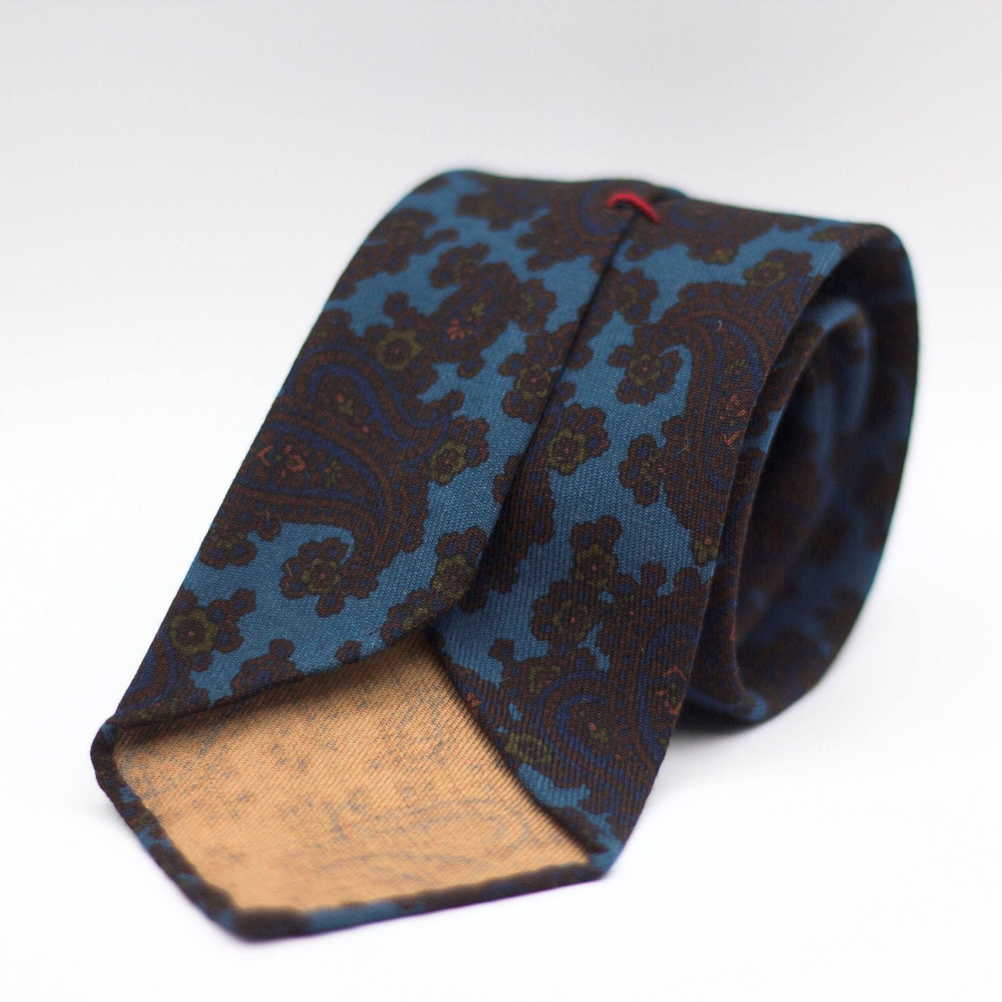 Cruciani & Bella 100%  Printed Wool  Unlined Hand rolled blades Light Blue, Brown, Green and Blue Paisley Motifs Tie Handmade in Italy 8 cm x 150 cm