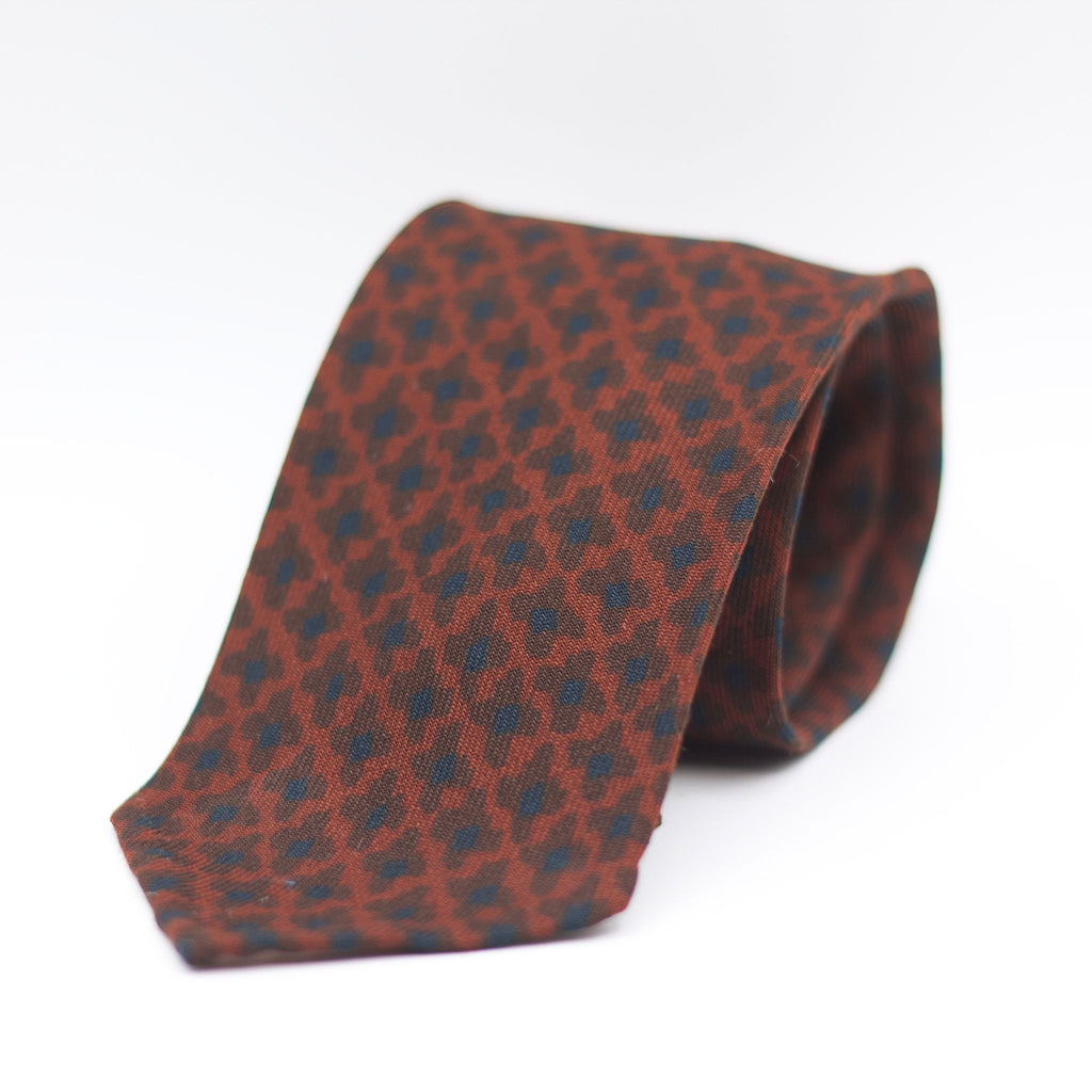 Cruciani & Bella 100%  Printed Wool  Unlined Hand rolled blades Light Brown, Brown and Blue  Motifs Tie Handmade in Italy 8 cm x 150 cm