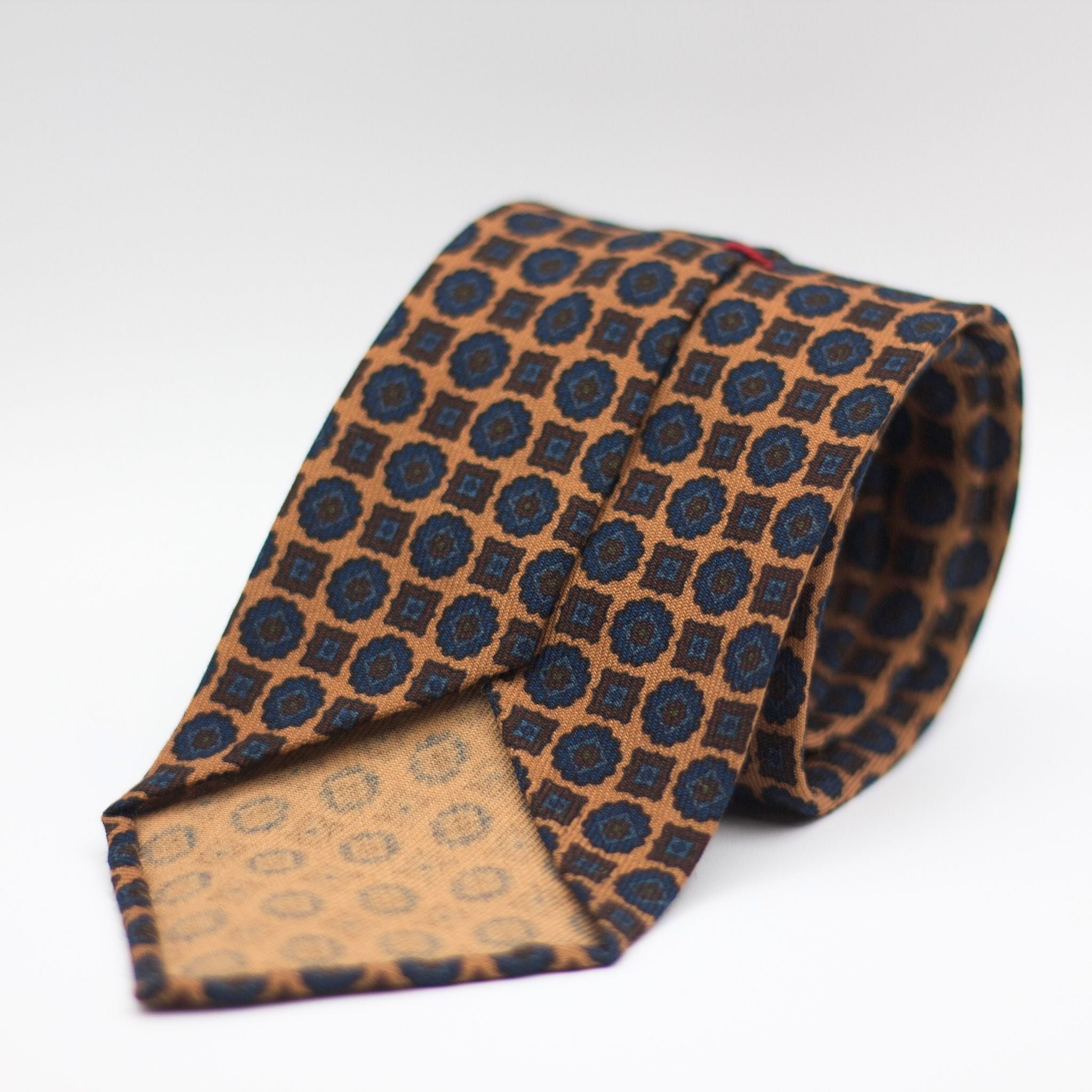 Cruciani & Bella 100%  Printed Wool  Unlined Hand rolled blades Light Brown, Brown and Blue Motifs Tie Handmade in Italy 8 cm x 150 cm