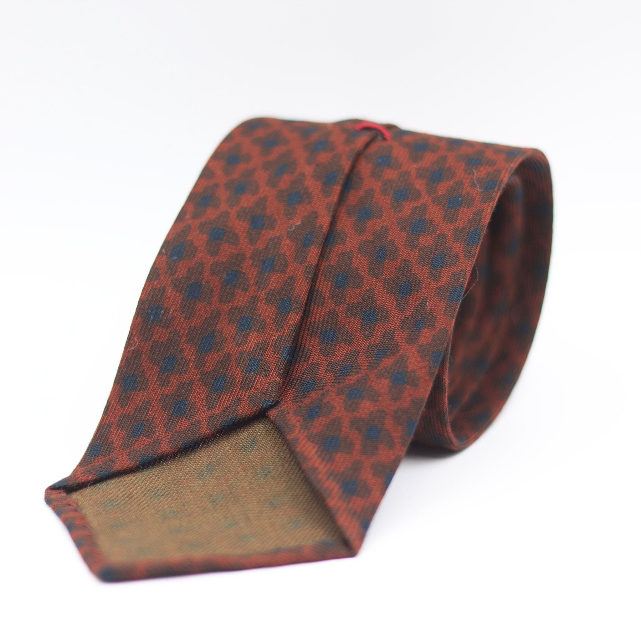 Cruciani & Bella 100%  Printed Wool  Unlined Hand rolled blades Light Brown, Brown and Blue  Motifs Tie Handmade in Italy 8 cm x 150 cm