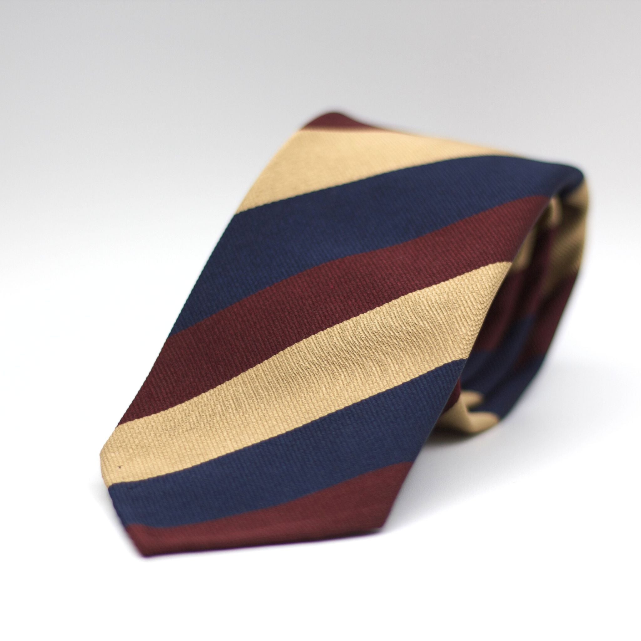 Cruciani & Bella 100% Silk Slim Shape Jacquard  Unlined Regimental " Prince of Wales Volunteers" Dark Blue, Gold and Wine stripes tie Handmade in Italy 8 cm x 150 cm