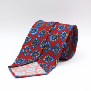 Cruciani & Bella 100%  Printed Wool  Unlined Hand rolled blades Red, Blue, light Blue and light beige Motif Tie Handmade in Italy 8 cm x 150 cm