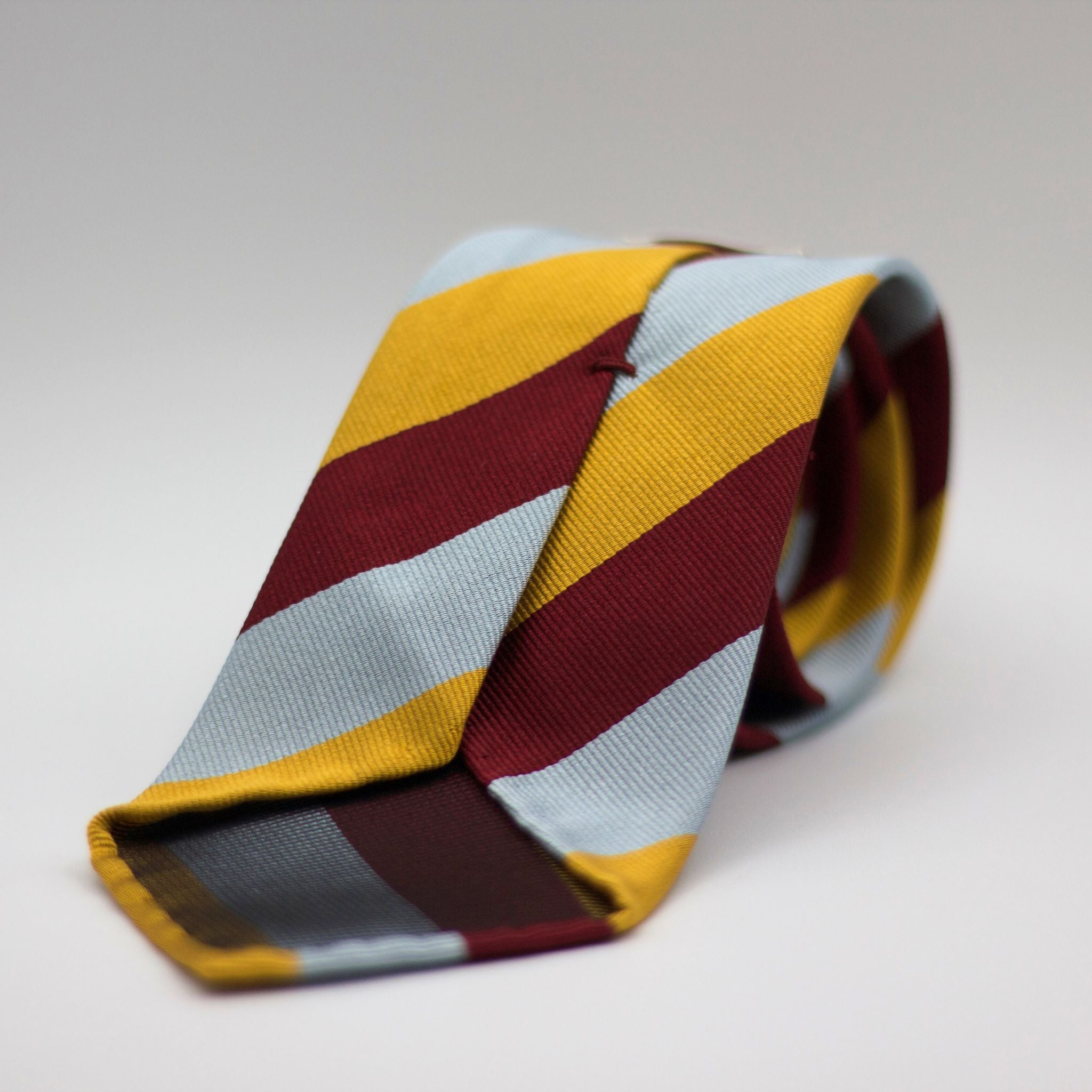 Cruciani & Bella 100% Silk Slim Shape Jacquard  Unlined Regimental "Royal Air Force Regiment" Wine, Gold and light sky-blue stripes tie Handmade in Italy 8 cm x 150 cm