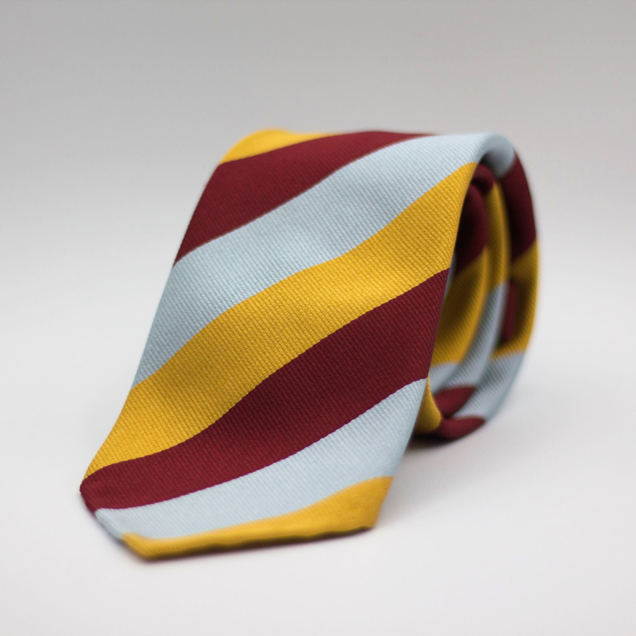 Cruciani & Bella 100% Silk Slim Shape Jacquard  Unlined Regimental "Royal Air Force Regiment" Wine, Gold and light sky-blue stripes tie Handmade in Italy 8 cm x 150 cm