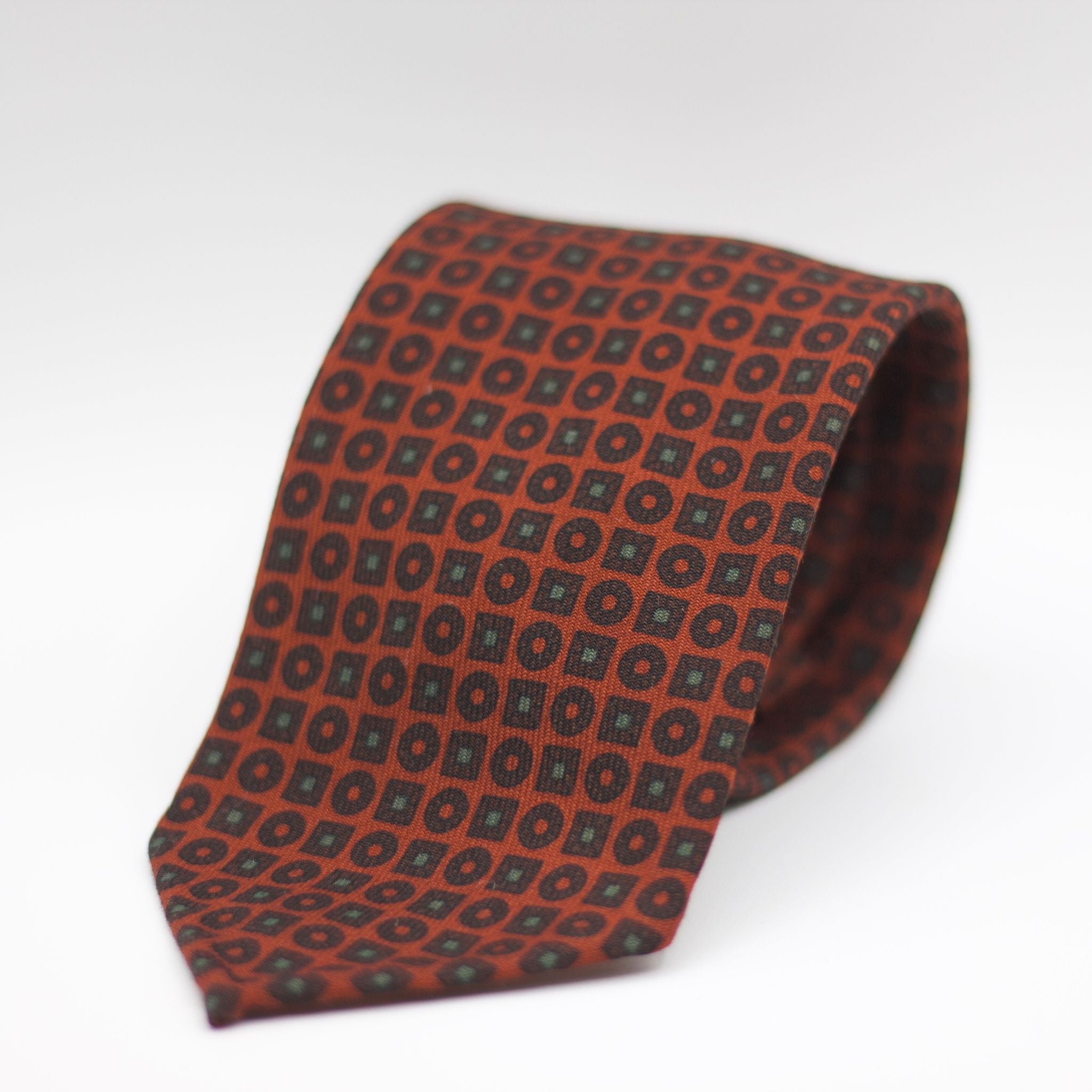 Cruciani & Bella 100%  Printed Wool  Unlined Hand rolled blades Rust, Brown and Green Motifs Tie Handmade in Italy 8 cm x 150 cm