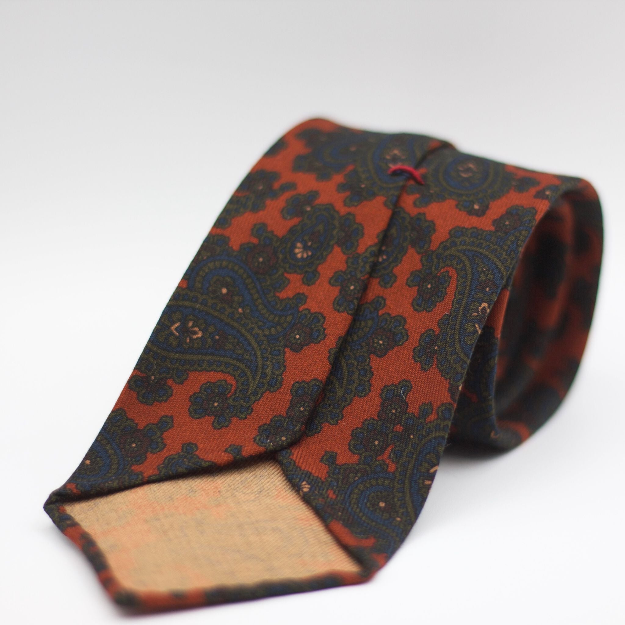 Cruciani & Bella 100%  Printed Wool  Unlined Hand rolled blades Rust, Green, Blue and Burgundy Paisley Motifs Tie Handmade in Italy 8 cm x 150 cm