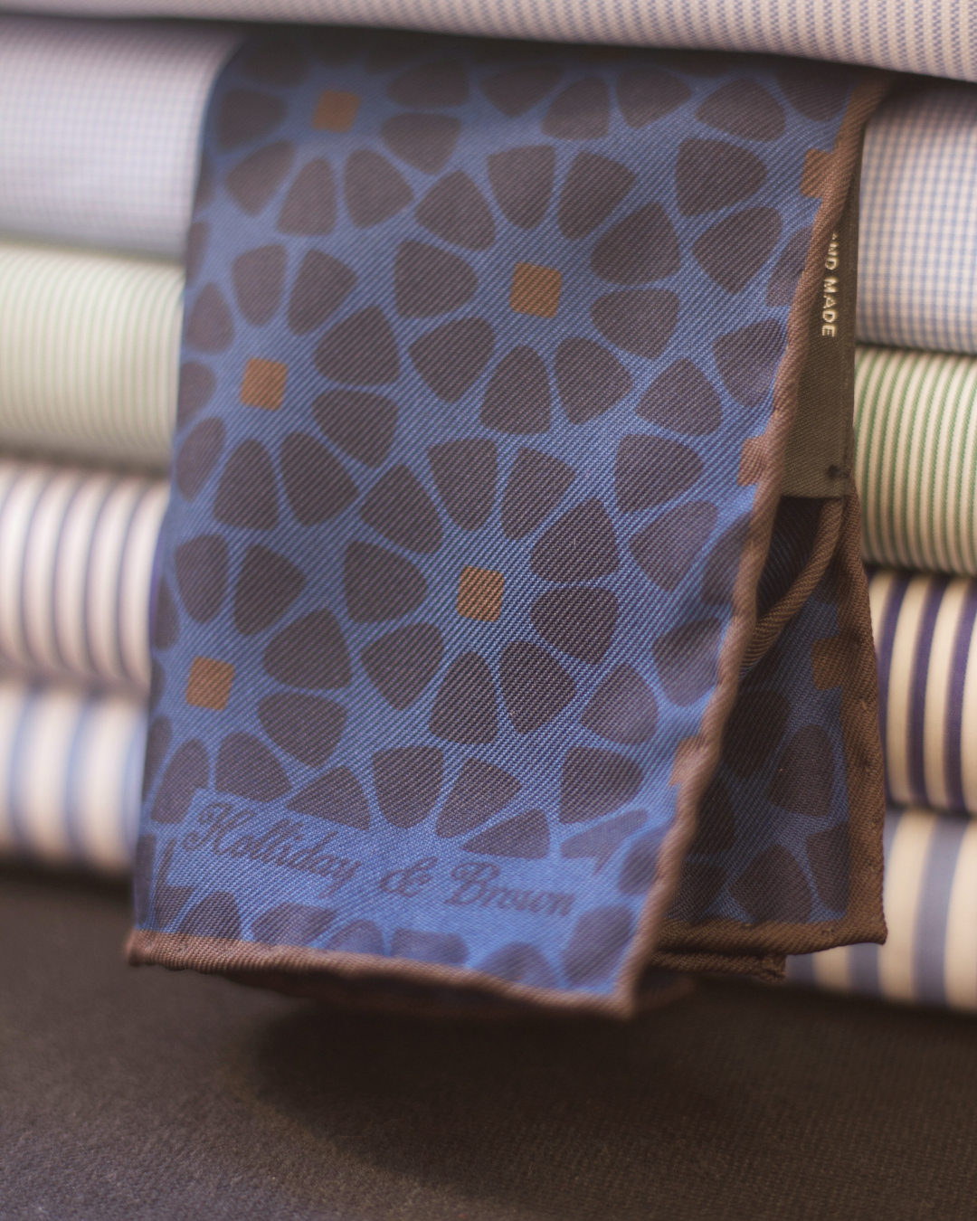 Holliday & Brown Hand-rolled   Holliday & Brown for Cruciani & Bella 100% Silk Blue, Brown Double Faces Patterned  Motif  Pocket Square Handmade in Italy 32 cm X 32 cm