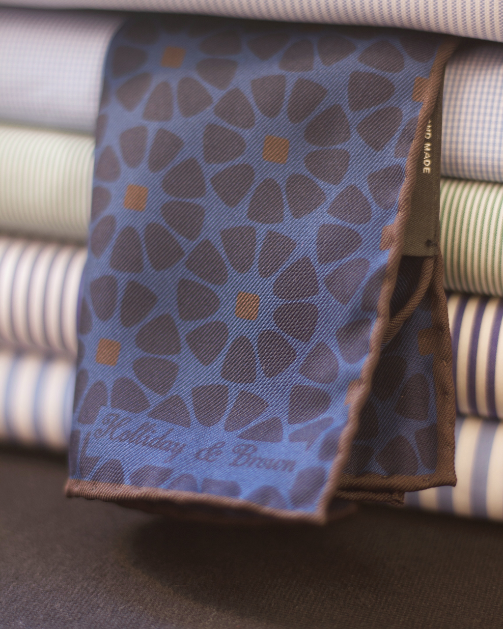 Holliday & Brown Hand-rolled   Holliday & Brown for Cruciani & Bella 100% Silk Blue, Brown Double Faces Patterned  Motif  Pocket Square Handmade in Italy 32 cm X 32 cm