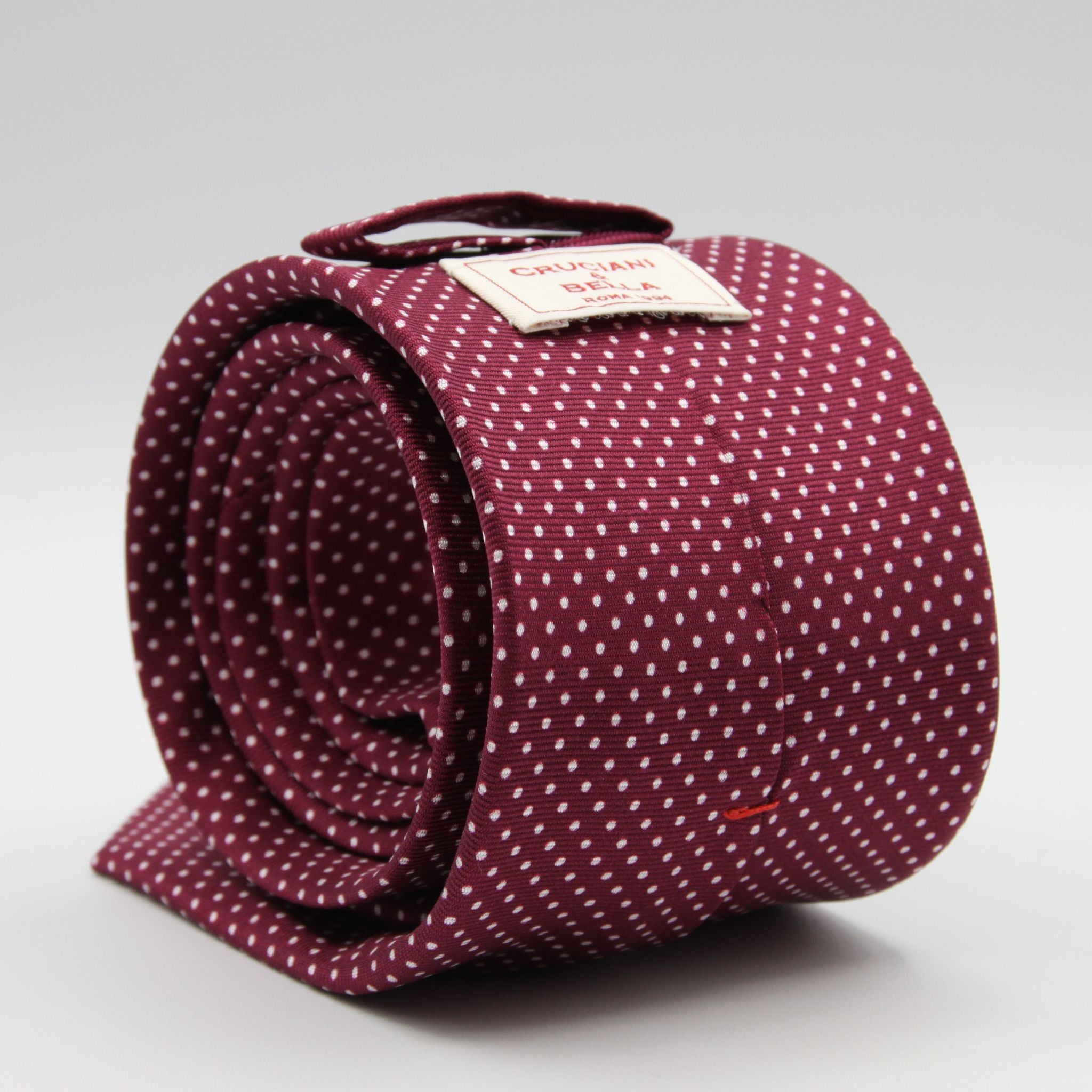 Cruciani &amp; Bella
100% Silk
Printed
Self-Tipped
Burgundy, White Pin Dots Tie
Handmade in Rome, Italy.
8 cm x 150 cm
#7802