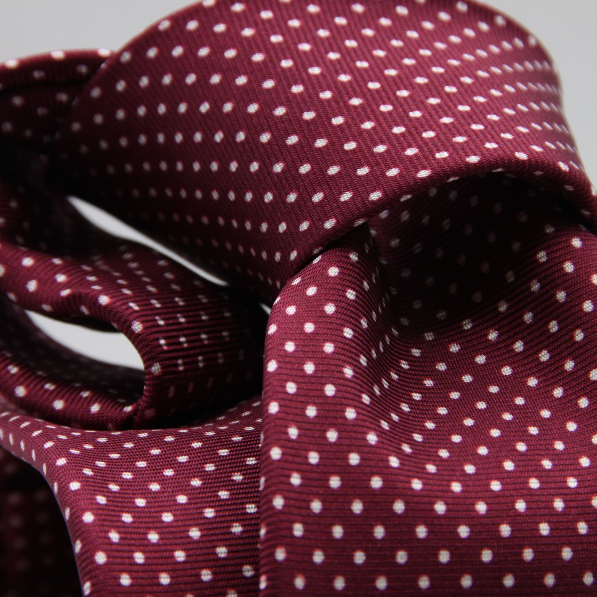 Cruciani &amp; Bella
100% Silk
Printed
Self-Tipped
Burgundy, White Pin Dots Tie
Handmade in Rome, Italy.
8 cm x 150 cm
#7802