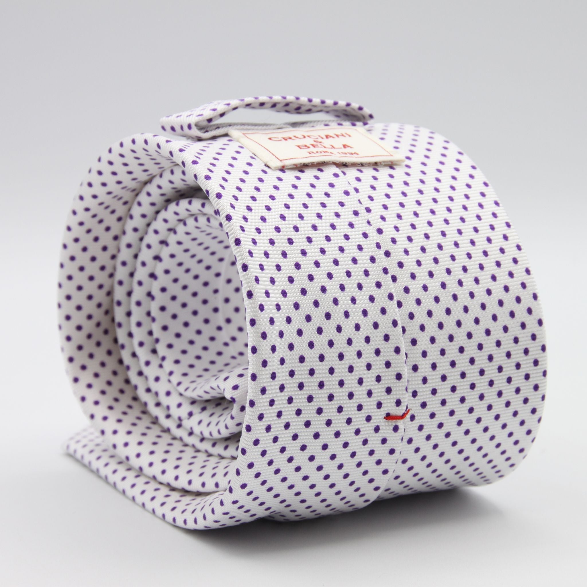 Cruciani &amp; Bella
100% Printed Silk

Self-Tipped
White, Purple Pindots Tie
Handmade in Rome, Italy.

8 cm x 150 cm
#8854
