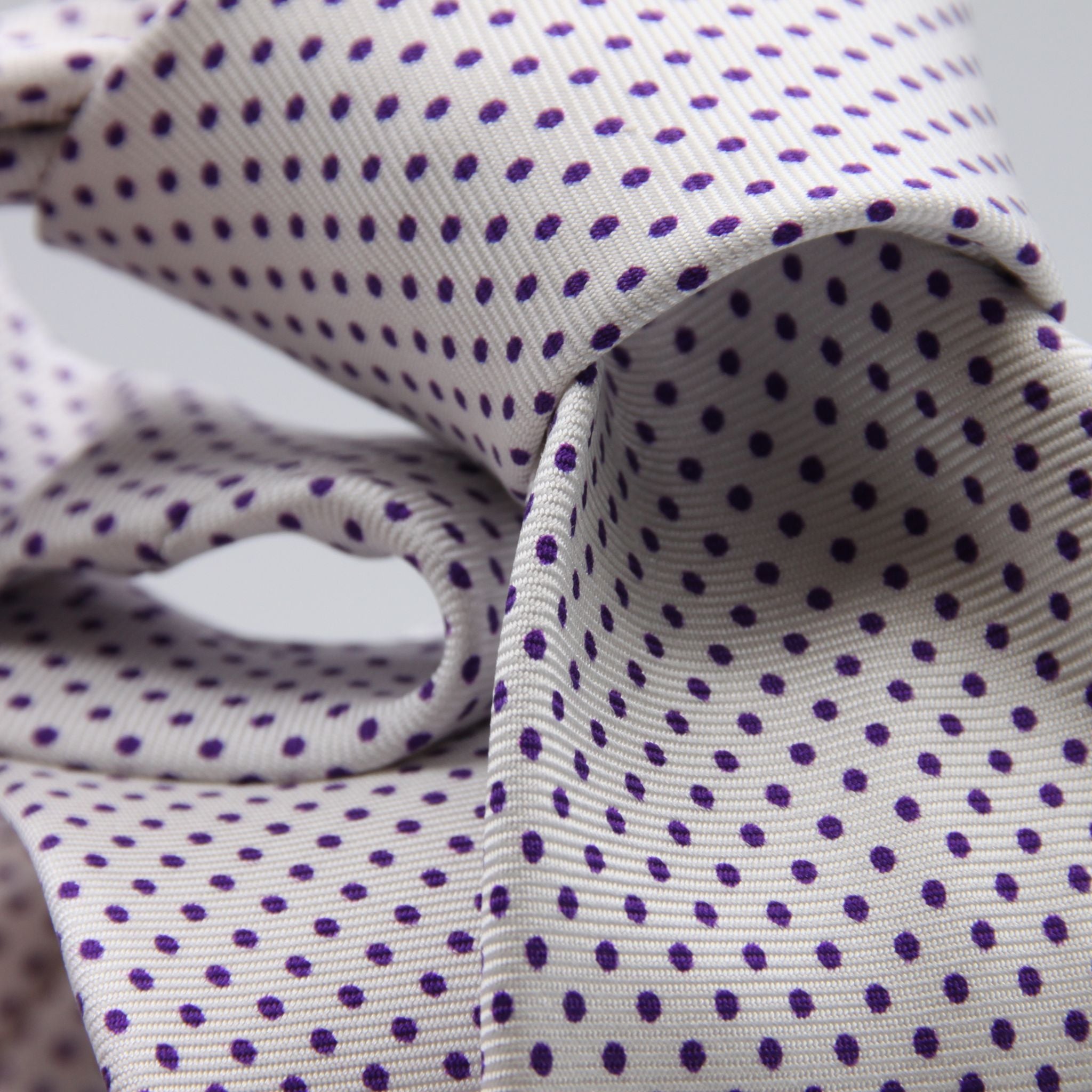 Cruciani &amp; Bella
100% Printed Silk

Self-Tipped
White, Purple Pindots Tie
Handmade in Rome, Italy.

8 cm x 150 cm
#8854