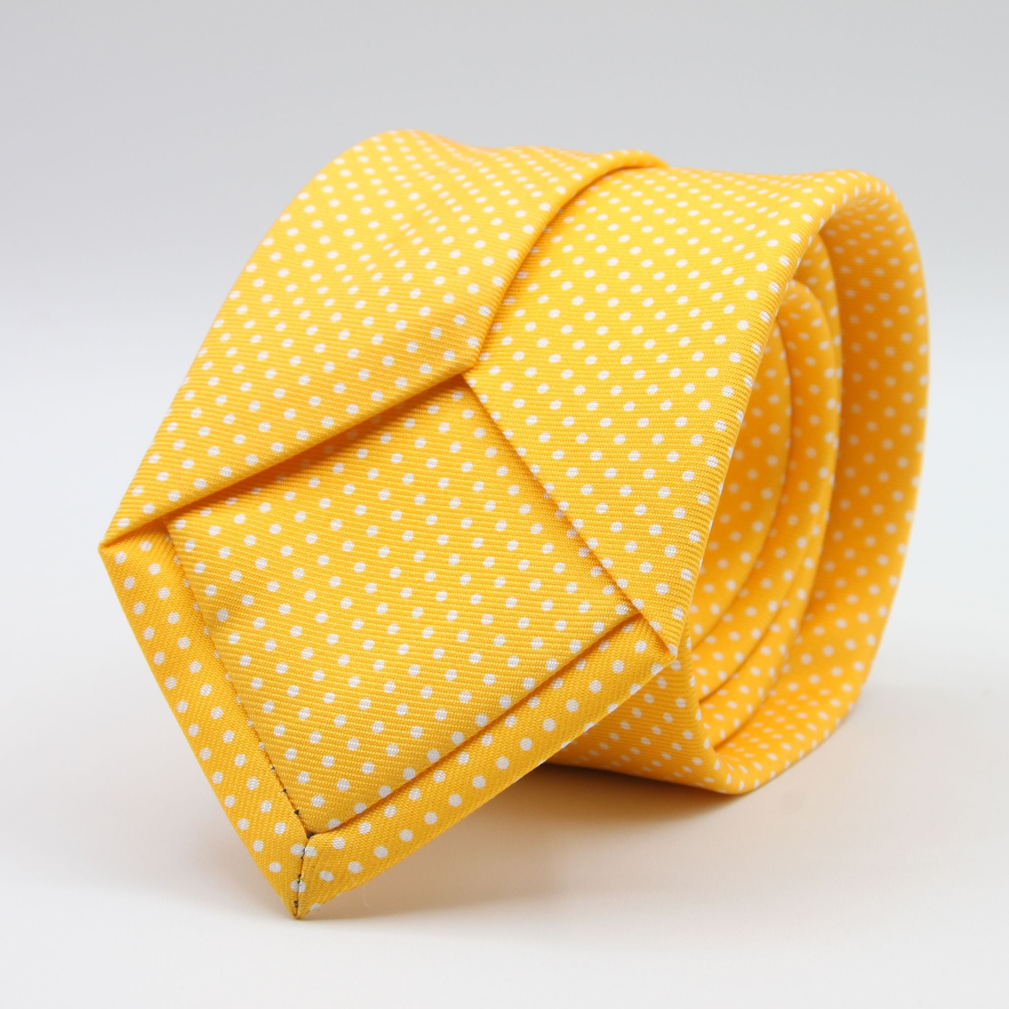 Cruciani &amp; Bella
100% Printed Silk

Self-Tipped
Yellow and White Pindots Tie&nbsp;
Handmade in Rome, Italy.

8 cm x 150 cm
#8855