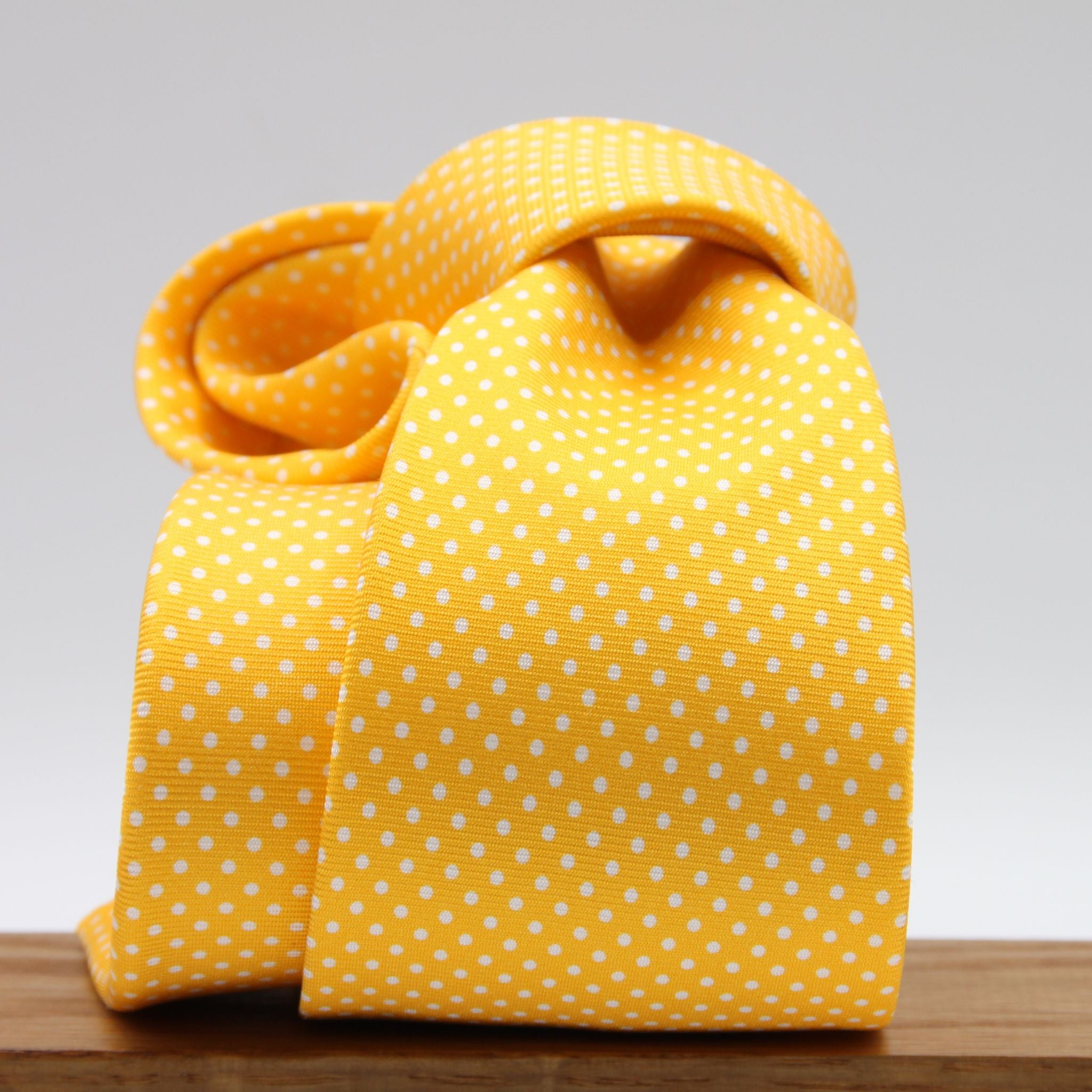 Cruciani &amp; Bella
100% Printed Silk

Self-Tipped
Yellow and White Pindots Tie&nbsp;
Handmade in Rome, Italy.

8 cm x 150 cm
#8855