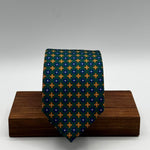 Cruciani &amp; Bella
100% Printed Silk&nbsp;
Tipped
Green, Rust, Blue and Beige Motif Tie
Handmade in Italy
8 cm x 148 cm
New Old Stock