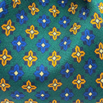 Cruciani &amp; Bella
100% Printed Silk&nbsp;
Tipped
Green, Rust, Blue and Beige Motif Tie
Handmade in Italy
8 cm x 148 cm
New Old Stock