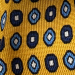Cruciani &amp; Bella
100% Printed Silk&nbsp;
Tipped
Yellow, Blue, Light Blue and White Motif Tie
Handmade in Italy
8,5 cm x 148 cm
New Old Stock
#10136
