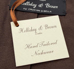 Holliday &amp; Brown Vintage
100% Silk
Tipped
Brown Plain Tie with a circular pattern
Handmade in England
9 cm x 146 cm
#6588