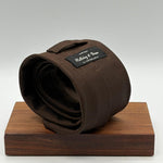 Holliday &amp; Brown Vintage
100% Silk
Tipped
Brown Plain Tie with a circular pattern
Handmade in England
9 cm x 146 cm
#6588