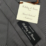 Holliday &amp; Brown Vintage
100% Silk
Tipped
Black and Off White Stripes Tie
Handmade in England
9 cm x 146 cm
#10193