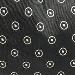 Holliday &amp; Brown Vintage
100% Silk
Tipped
Black and Off White circular pattern
Handmade in England
9,5 cm x 146 cm
#10194