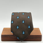 Cruciani &amp; Bella
100% Silk&nbsp;
Woven Jaquard
Self Tipped&nbsp;
Brown Tie with a Blue Cat
Handmade in Italy
9cm x 148 cm
New Old Stock
#10197