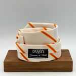 Drake's for Cruciani &amp; Bella
100% Silk
Garza Piccola
Tipped&nbsp;
White, Orange and Yellow Stripes&nbsp; Tie
Handmade in England
9 cm x 146 cm
#10219