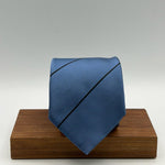 Drake's for Cruciani &amp; Bella
100% Silk
Satin
Tipped&nbsp;
Light Blue and Blue Stripes Tie
Handmade in England
9 cm x 146 cm
#5408