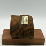 Drake's for Cruciani &amp; Bella
100% Silk
Wowen Jaquard
Tipped&nbsp;
Brown
Orange Motif
Handmade in England
9,5 cm x 146 cm
#6528