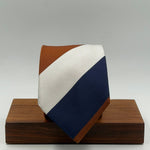 Cruciani &amp; Bella
50% Cotton 50% Silk

Tipped&nbsp;
Bleu, Brown and Off White stripes

Handmade in Italy
9 cm x 148 cm
New Old Stock