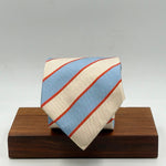 Cruciani &amp; Bella
40% Cotton 60% Silk

Tipped&nbsp;
Light Bleu, Beige and Orange stripes

Handmade in Italy
9 cm x 148 cm
New Old Stock