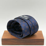 Drake's for Cruciani &amp; Bella
100%&nbsp; Woven Silk
Tipped
Blue and Brown Geometric motif Tie
Handmade in London, England
9 cm x 150 cm