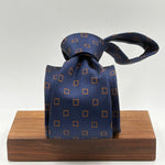 Drake's for Cruciani &amp; Bella
100%&nbsp; Woven Silk
Tipped
Blue and Brown Geometric motif Tie
Handmade in London, England
9 cm x 150 cm
