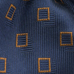 Drake's for Cruciani &amp; Bella
100%&nbsp; Woven Silk
Tipped
Blue and Brown Geometric motif Tie
Handmade in London, England
9 cm x 150 cm