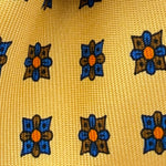 Drake's for Cruciani &amp; Bella
100% Printed Silk&nbsp;
Tipped
Yelllow, Blue, Orange and Brown Motif
Handmade in England
9,5 cm x 148 cm