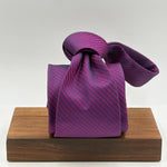 Drake's for Cruciani &amp; Bella
100%&nbsp; Woven Silk
Tipped
Purple and Black motif Stripes Tie
Handmade in London, England
9,5 cm x 150 cm