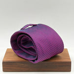 Drake's for Cruciani &amp; Bella
100%&nbsp; Woven Silk
Tipped
Purple and Black motif Stripes Tie
Handmade in London, England
9,5 cm x 150 cm