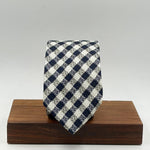 Drake's for Cruciani &amp; Bella
100%&nbsp; Woven Silk
Tipped
Blue, Off White and Grey Square motif Tie
Handmade in London, England
7,5 cm x 149 cm