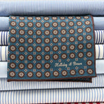 Holliday &amp; Brown
Hand-rolled&nbsp;&nbsp;
Holliday &amp; Brown for Cruciani &amp; Bella
100% Silk
Denim Blue, Light Brown and Off White
Double Faces
Motif&nbsp; Pocket Square
Handmade in Italy

32 cm X 32 cm
#10337