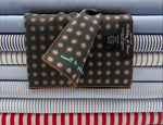 Holliday &amp; Brown
Hand-rolled&nbsp;&nbsp;
Holliday &amp; Brown for Cruciani &amp; Bella
100% Silk
Dust Grey, Brown and Hazelnut
Single Faces
Motif&nbsp; Pocket Square
Handmade in Italy

32 cm X 32 cm
#10339