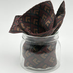 Holliday &amp; Brown
Hand-rolled&nbsp;&nbsp;
Holliday &amp; Brown for Cruciani &amp; Bella
100% Silk
Red Wine, Light Brown and Black
Single Face
Motif&nbsp; Pocket Square
Handmade in Italy

32 cm X 32 cm
#10349