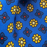 Cruciani &amp; Bella
100% Printed Silk&nbsp;
Tipped
Royal Blue, Yellow, Red and White Motif Tie
Handmade in Italy
8,5 cm x 148 cm
New Old Stock
#10443