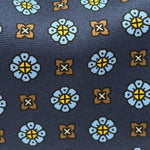 Cruciani &amp; Bella
100% Printed Silk&nbsp;
Tipped
Blue, Light Blue, Brown and Yellow Motif Tie
Handmade in Italy
8,5 cm x 148 cm
New Old Stock
#10457